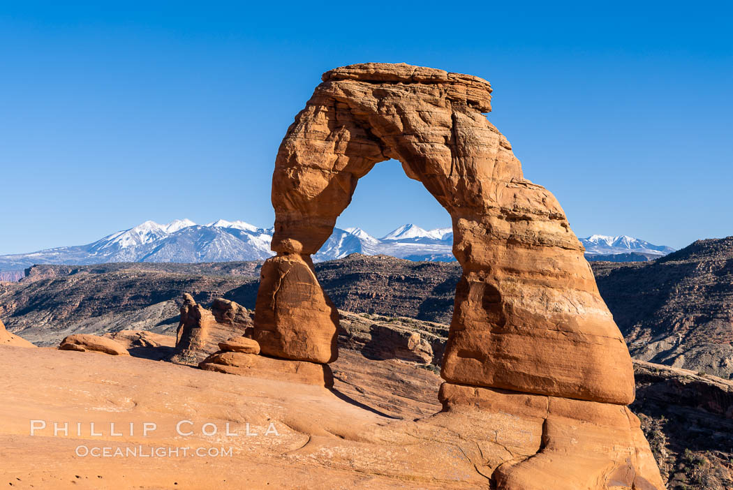 Delicate Arch and La Sal Mountains, Arches National Park. Utah, USA, natural history stock photograph, photo id 37858