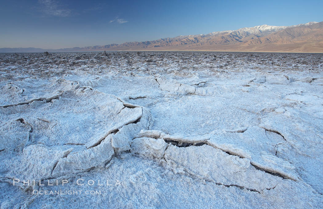 Devils Golf Course. Evaporated salt has formed into gnarled, complex crystalline shapes on the salt pan of Death Valley National Park, one of the largest salt pans in the world.  The shapes are constantly evolving as occasional floods submerge the salt concretions before receding and depositing more salt. California, USA, natural history stock photograph, photo id 20599