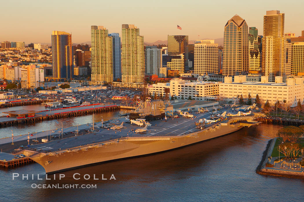 Downtown San Diego and USS Midway.  The USS Midway was a US Navy aircraft carrier, launched in 1945 and active through the Vietnam War and Operation Desert Storm, as of 2008 a museum along the downtown waterfront in San Diego. California, USA, natural history stock photograph, photo id 22289