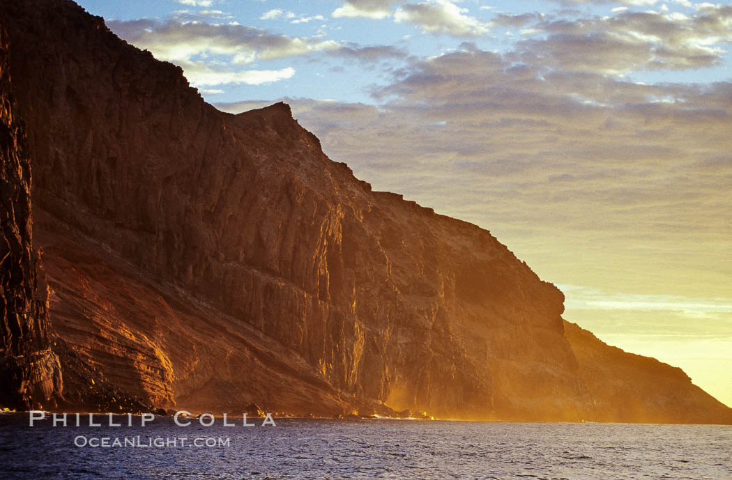 East face and shoreline of southernmost morro, daybreak. Guadalupe Island (Isla Guadalupe), Baja California, Mexico, natural history stock photograph, photo id 06152