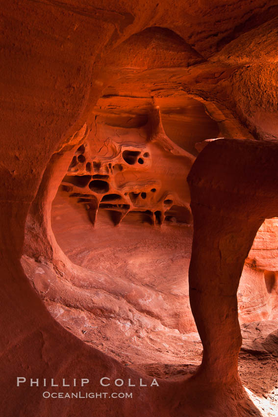 Fire Arch or Windstone Arch, also known as Fire Cave, is a tiny cave with a miniature arch and a group of natural pocket holes. Many people walk by this cave without realizing it is there!, Valley of Fire State Park