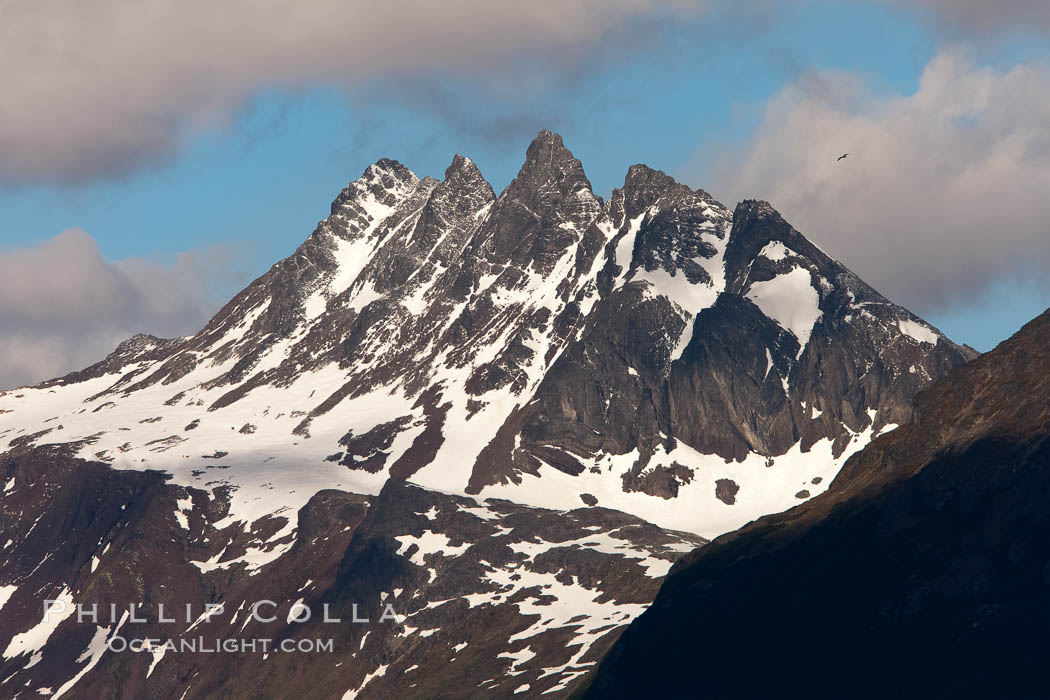 The Five Brothers (Mount Cinco Hermanos, 1280m) in the Fuegian Andes, a cluster of peaks above Ushuaia, the capital of the Tierra del Fuego region of Argentina, Beagle Channel