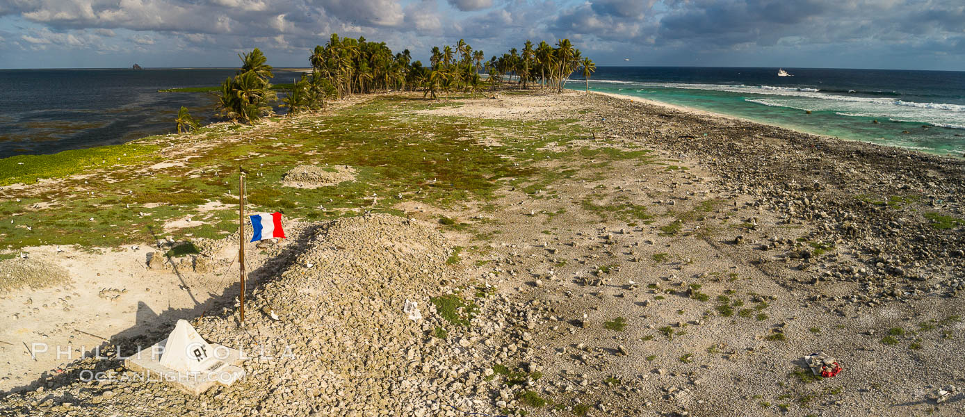 The French tricolor flag flies over Clipperton Island at sunset. Clipperton Island, a minor territory of France also known as Ile de la Passion, is a spectacular coral atoll in the eastern Pacific. By permit HC / 1485 / CAB (France)