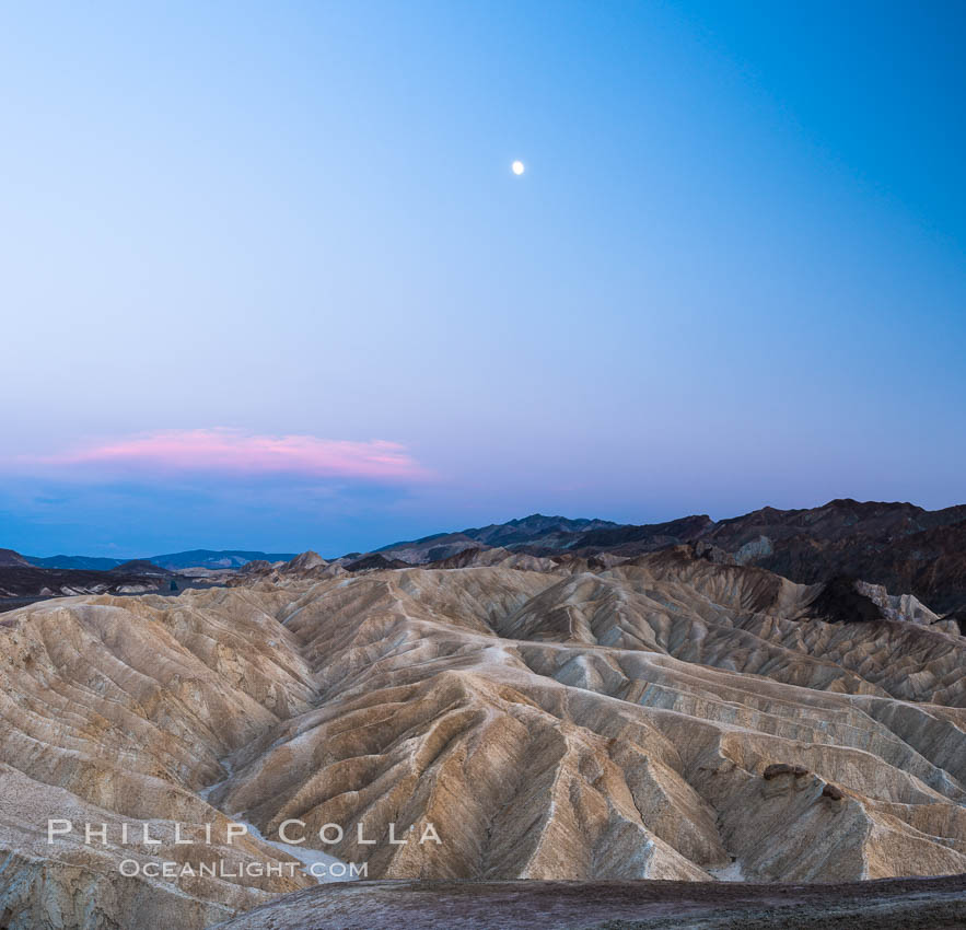 Full moon over Zabriskie Point landscape, Death Valley National Park, California