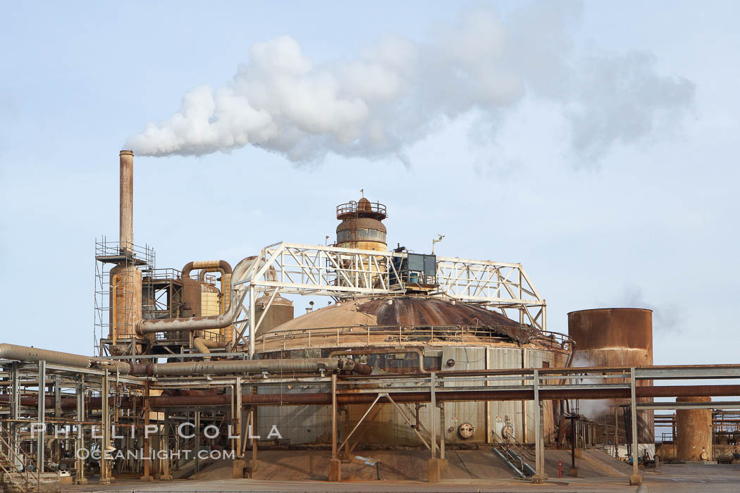 Steam is released from a geothermal power generation plant near the Salton Sea in Imperial County.  Geothermal power generation uses steam heated deep within the Earth's crust to power turbines and generate electricity.  Imperial County has more than 11 known geothermal fields in the Brawley and Salton Sea areas and holds great potential for the generation of electicity by tapping into this geothermal energy source. California, USA, natural history stock photograph, photo id 22520