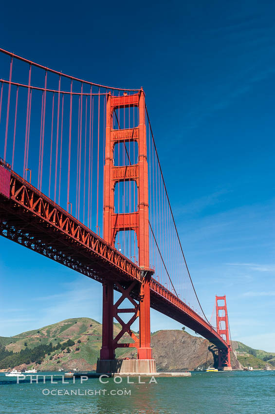 Golden Gate Bridge, viewed from Fort Point, with the Marin Headlands visible in the distance.  San Francisco. California, USA, natural history stock photograph, photo id 09053