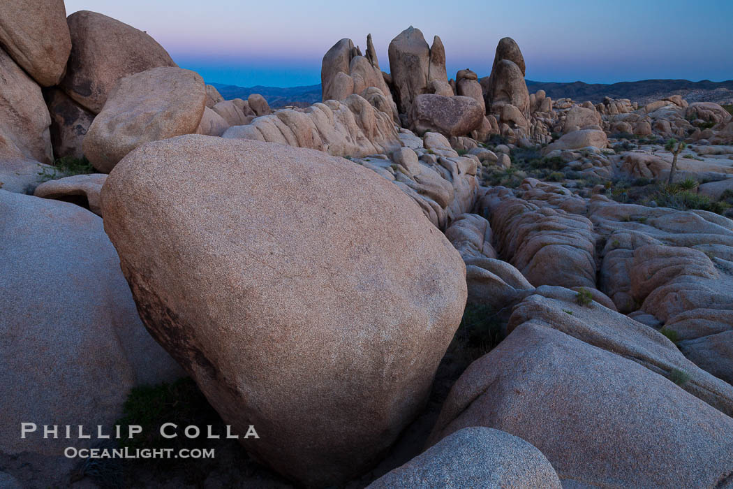 Ancient granite boulders at Joshua Tree National park, at sunset., natural history stock photograph, photo id 26803