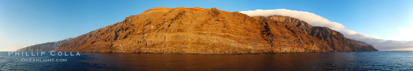 Guadalupe Island at sunrise, panorama.  Volcanic coastline south of Pilot Rock and Spanish Cove, near El Faro lighthouse. Guadalupe Island (Isla Guadalupe), Baja California, Mexico, natural history stock photograph, photo id 19497