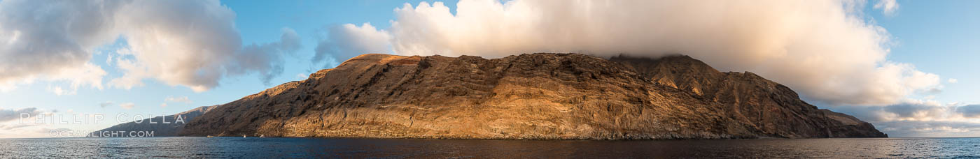 Guadalupe Island at sunrise, panorama. Volcanic coastline south of Pilot Rock and Spanish Cove, near El Faro lighthouse, Guadalupe Island (Isla Guadalupe)