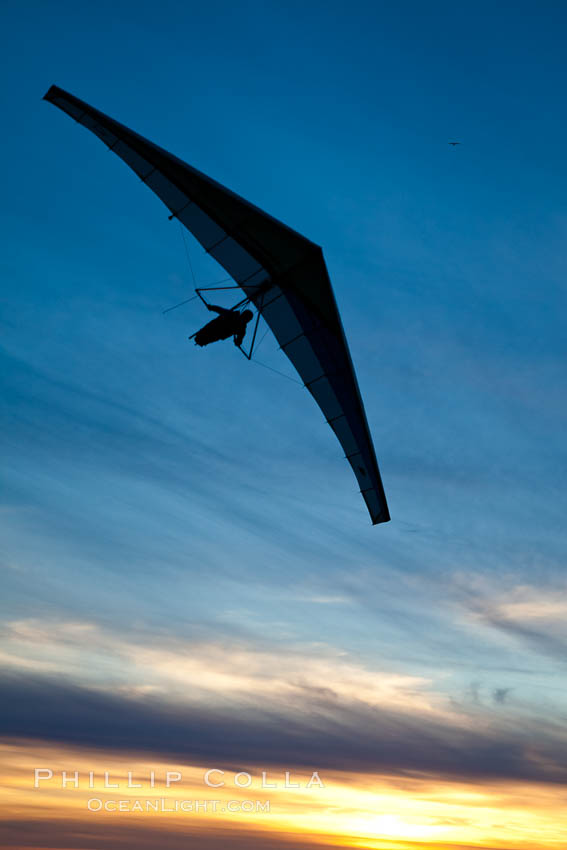 Hang Glider soaring at Torrey Pines Gliderport, sunset, flying over the Pacific Ocean. La Jolla, California, USA, natural history stock photograph, photo id 24290