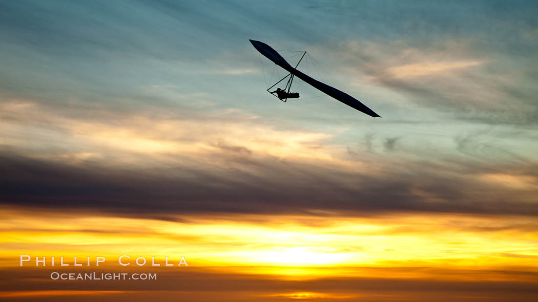 Hang Glider soaring at Torrey Pines Gliderport, sunset, flying over the Pacific Ocean. La Jolla, California, USA, natural history stock photograph, photo id 24291