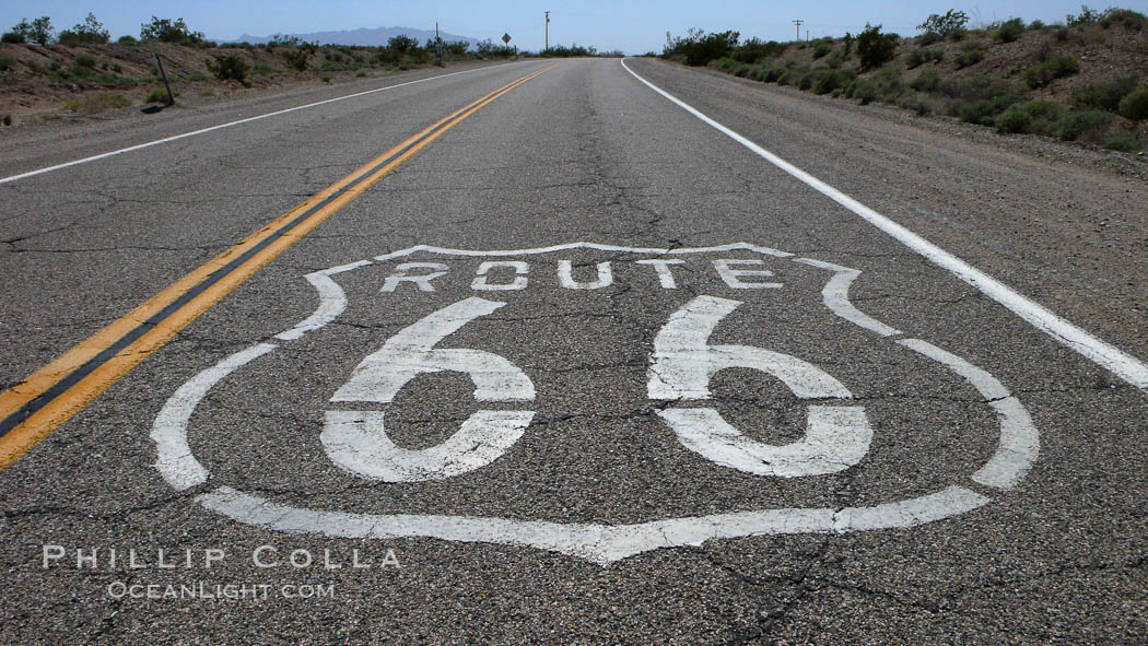 Route 66 (also known as U.S. Route 66, The Main Street of America, The Mother Road and the Will Rogers Highway) was a highway in the U.S. Highway system. One of the original federal routes, US 66 was established in 1926 and originally ran from Chicago through Missouri, Kansas, Oklahoma, Texas, New Mexico, Arizona, and California, before ending at Los Angeles for a total of 2,448 miles. US 66 was officially decommissioned (i.e, removed from the offical U.S. Highway system) in 1985 after it was decided the route was no longer relevant and had been replaced by the Interstate Highway System