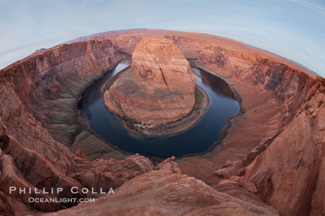 Horseshoe Bend.  The Colorado River makes a 180-degree turn at Horseshoe Bend.  Here the river has eroded the Navaho sandstone for eons, digging a canyon 1100-feet deep. Navajo Tribal Lands, Page, Arizona, USA, natural history stock photograph, photo id 18030