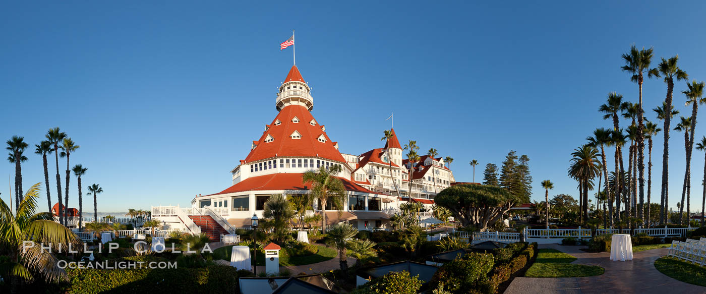 Hotel del Coronado, known affectionately as the Hotel Del. It was once the largest hotel in the world, and is one of the few remaining wooden Victorian beach resorts. It sits on the beach on Coronado Island, seen here with downtown San Diego in the distance. It is widely considered to be one of Americas most beautiful and classic hotels. Built in 1888, it was designated a National Historic Landmark in 1977. California, USA, natural history stock photograph, photo id 27104