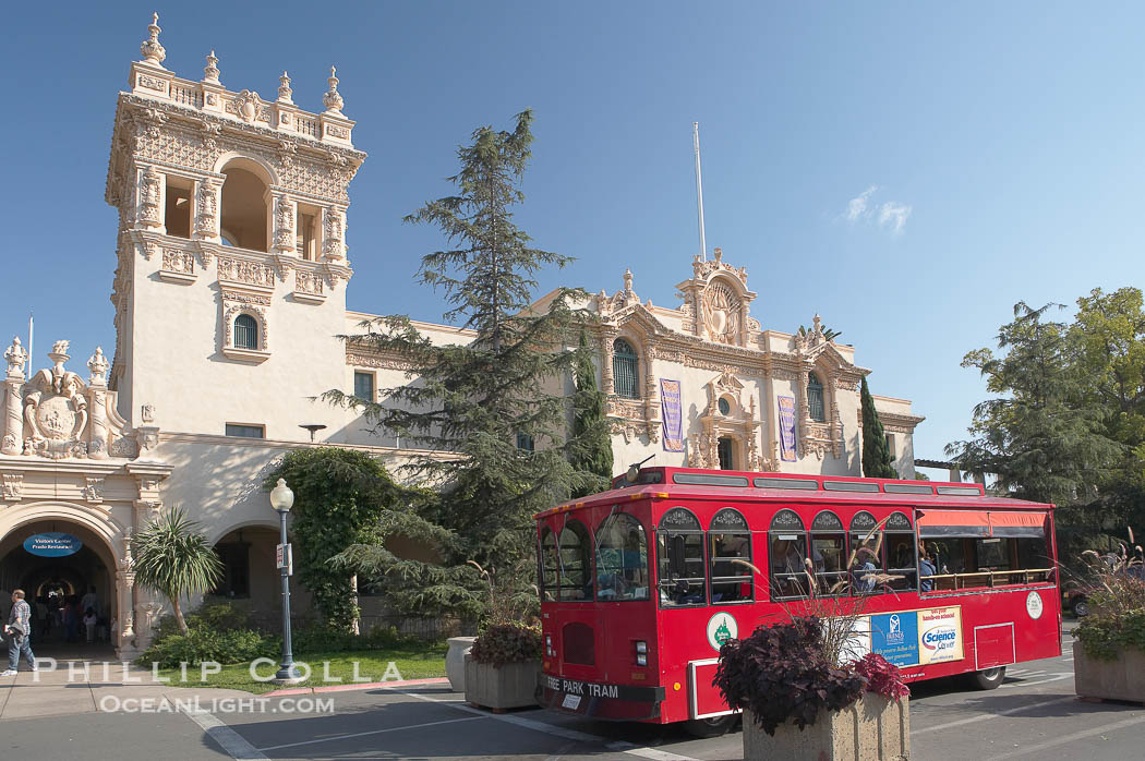 The House of Hospitality in Balboa Park, San Diego, and one of the free buses that shuttles tourists around the park., natural history stock photograph, photo id 14606