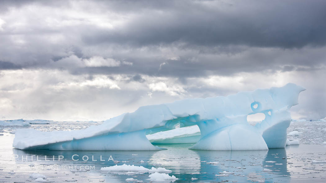Iceberg, clouds and water, Neko Harbor, Antarctica. Antarctic Peninsula, natural history stock photograph, photo id 25662