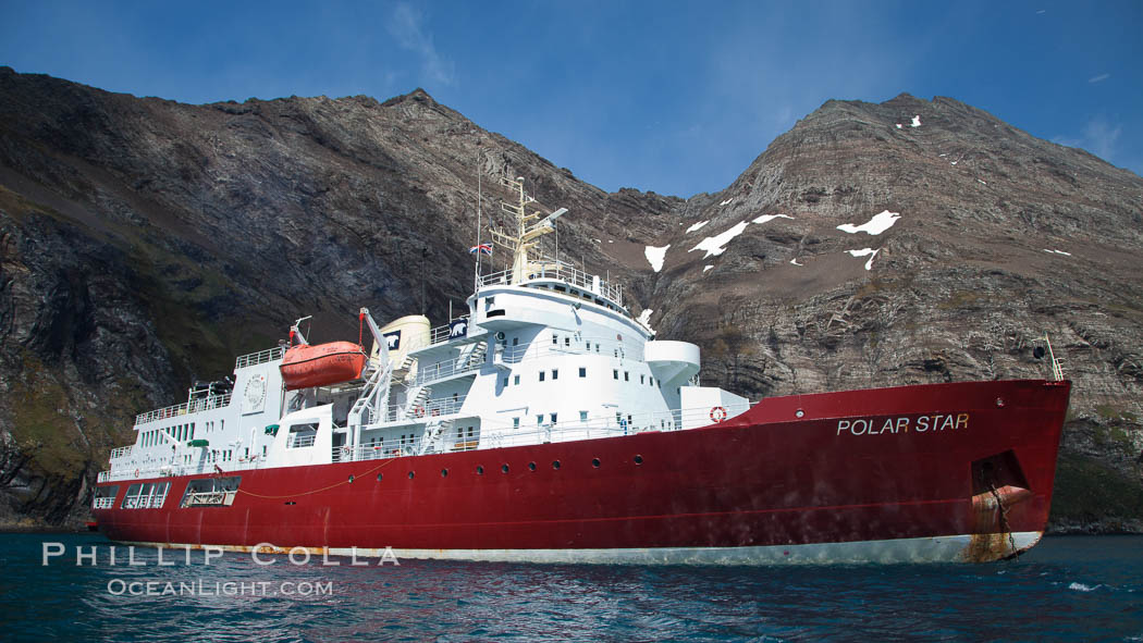 Hercules Bay, with icebreaker M/V Polar Star at anchor, below the steep mountains of South Georgia Island., natural history stock photograph, photo id 24553