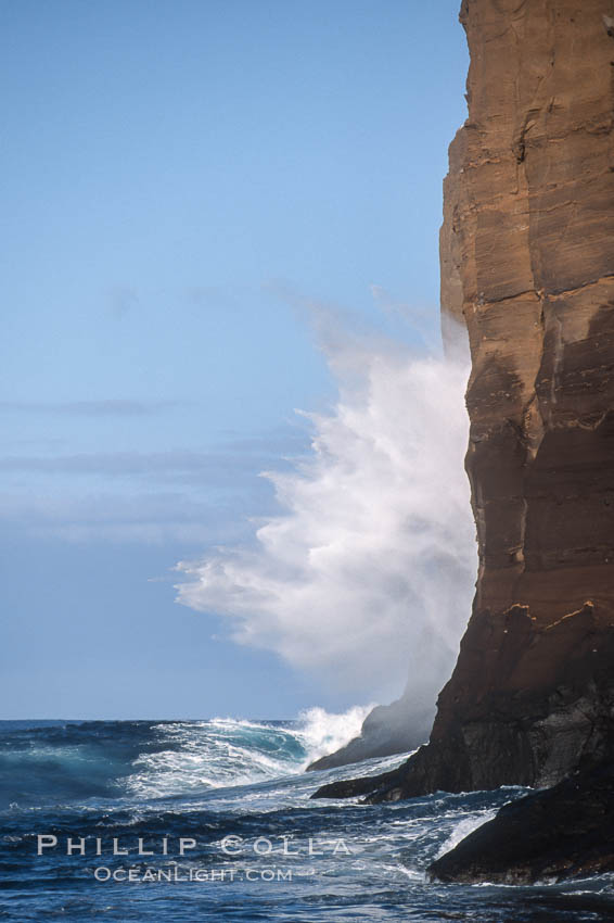 Waves crash against eastern cliffs of Isla Afuera. Guadalupe Island (Isla Guadalupe), Baja California, Mexico, natural history stock photograph, photo id 03703