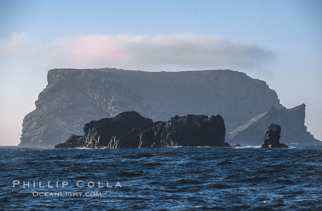Church Rock (left) and Skip's Rock (right) with Isla Afuera in the distance, looking south. Guadalupe Island (Isla Guadalupe), Baja California, Mexico, natural history stock photograph, photo id 06157