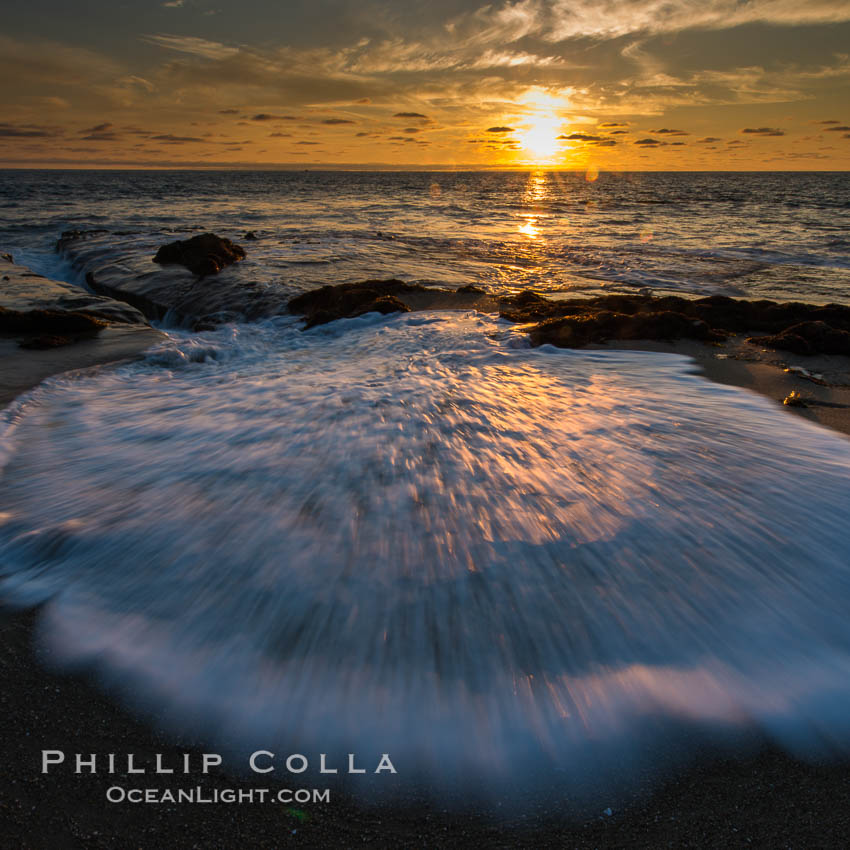 La Jolla coast sunset, waves wash over sandstone reef, clouds and sky. California, USA, natural history stock photograph, photo id 27890