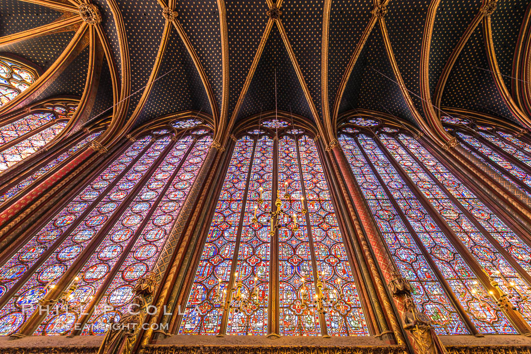 La Sainte-Chapelle, The Holy Chapel, is one of the only surviving buildings of the Capetian royal palace on the Ile de la Cite in the heart of Paris, France. It was commissioned by King Louis IX of France to house his collection of Passion Relics, including the Crown of Thorns - one of the most important relics in medieval Christendom., natural history stock photograph, photo id 28032