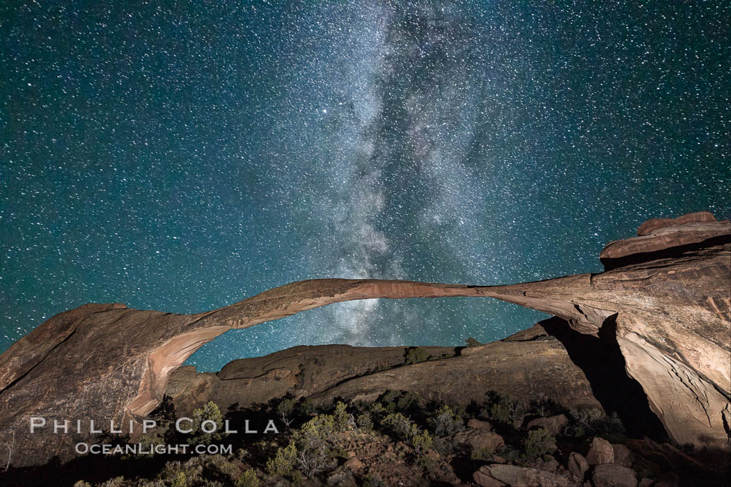 Landscape Arch and Milky Way, stars rise over the arch at night. (Note: this image was created before a ban on light-painting in Arches National Park was put into effect.  Light-painting is no longer permitted in Arches National Park). Utah, USA, natural history stock photograph, photo id 27868