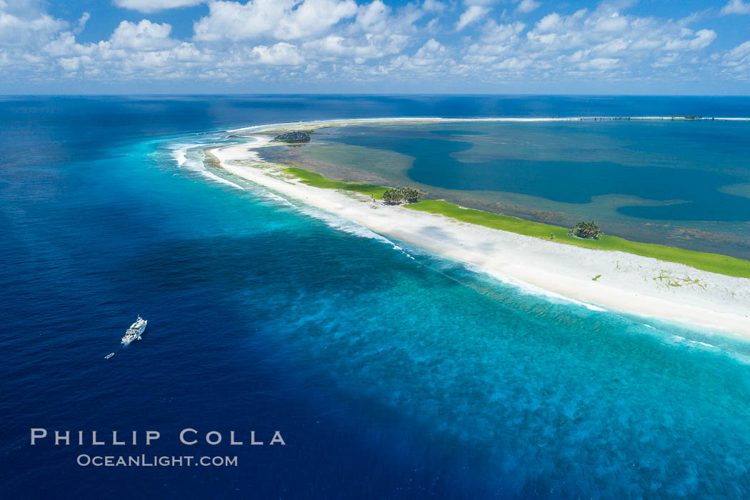Aerial photo of M/V Nautilus Undersea at Clipperton Island.  Clipperton Island, a minor territory of France also known as Ile de la Passion, is a small (2.3 sq mi) but  spectacular coral atoll in the eastern Pacific. By permit HC / 1485 / CAB (France)., natural history stock photograph, photo id 32873