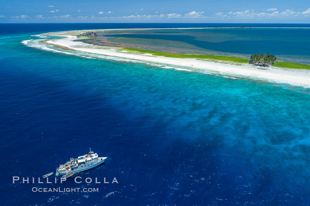 Aerial photo of M/V Nautilus Undersea at Clipperton Island.  Clipperton Island, a minor territory of France also known as Ile de la Passion, is a small (2.3 sq mi) but  spectacular coral atoll in the eastern Pacific. By permit HC / 1485 / CAB (France)., natural history stock photograph, photo id 32901