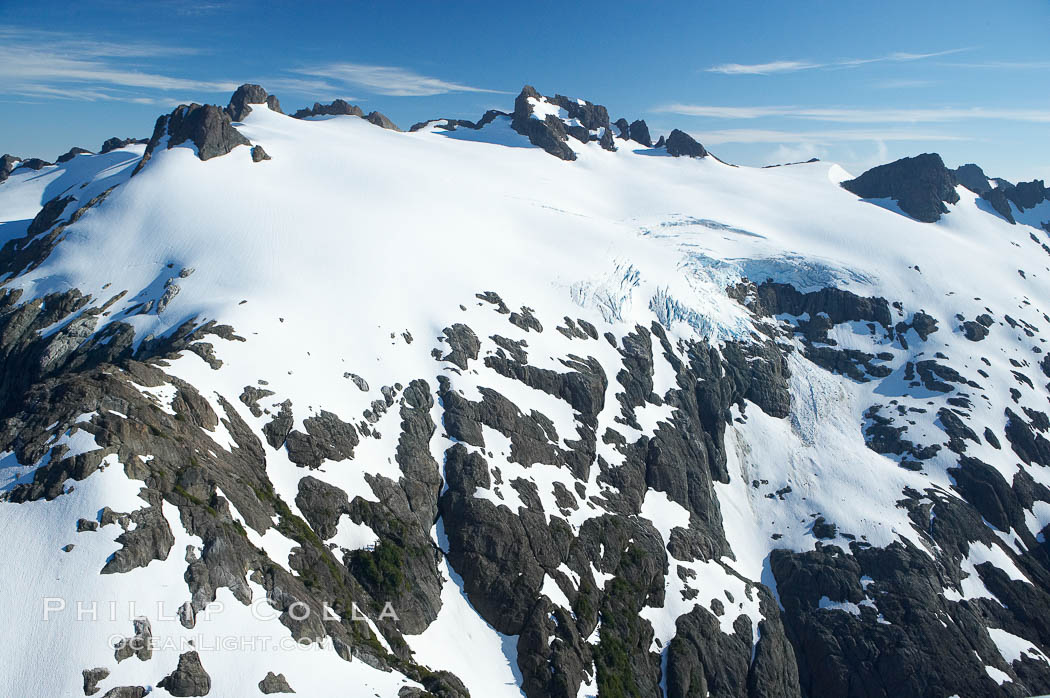 Glaciers on the summit of Mariner Mountain, on the west coast of Vancouver Island, British Columbia, Canada, part of Strathcona Provincial Park, located 36 km (22 mi) north of Tofino.  It is 1,771 m (5,810 ft) high and is snow covered year-round., natural history stock photograph, photo id 21120
