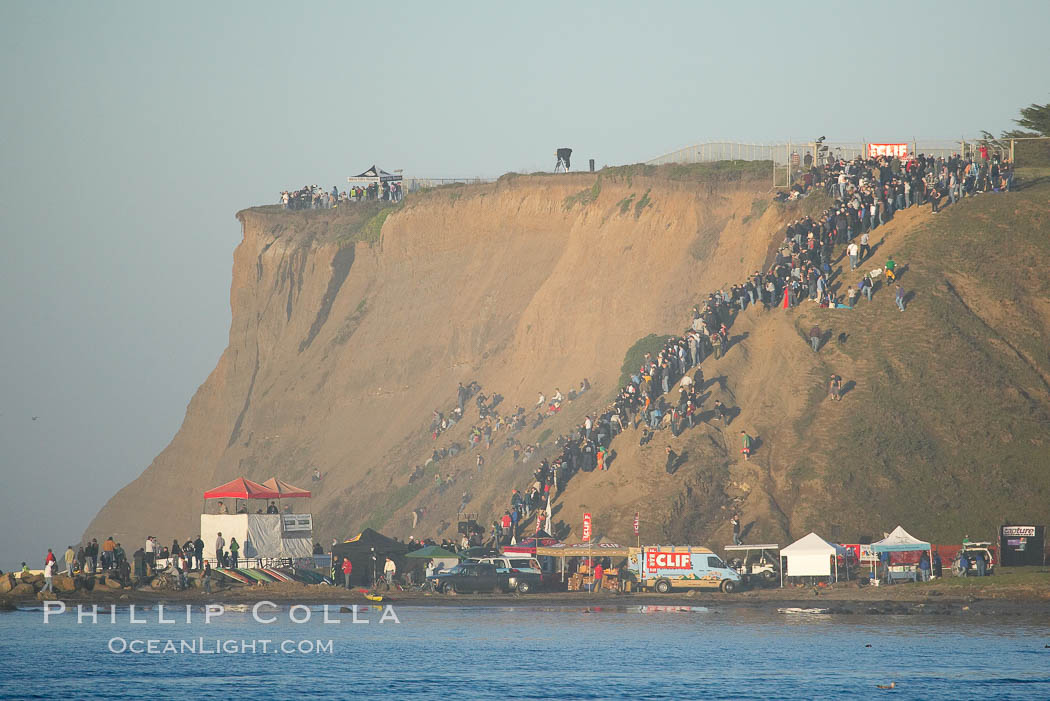 Mavericks surf contest crowd enjoys the sun and warm weather on the Pillar Point cliffs, February 7, 2006. Half Moon Bay, California, USA, natural history stock photograph, photo id 15344