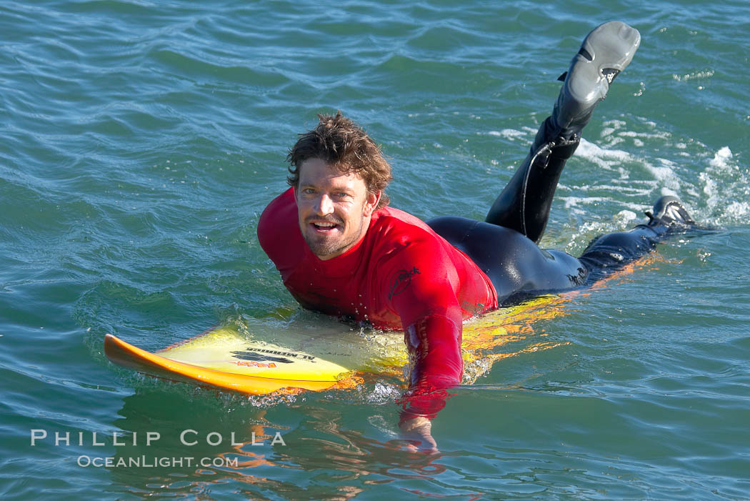 Ryan Seelbach paddles out to the lineup for his heat four surf, Seelbach would advance to the semis, Mavericks surf contest, February 7, 2006. Half Moon Bay, California, USA, natural history stock photograph, photo id 15347