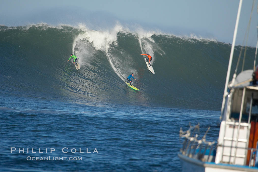 Brock Little (green), Shane Desmond (blue), Randy Cone (orange), heat one, Mavericks surf contest, February 7, 2006. Half Moon Bay, California, USA, natural history stock photograph, photo id 15363