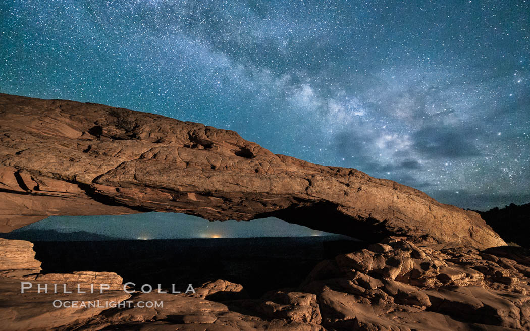 The Milky Way arching over Mesa Arch at night, Canyonlands National Park, Utah