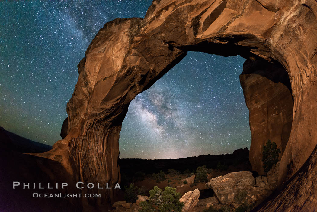 Milky Way and Stars over Broken Arch, Arches National Park, Utah (Note: this image was created before a ban on light-painting in Arches National Park was put into effect.  Light-painting is no longer permitted in Arches National Park). USA, natural history stock photograph, photo id 29238