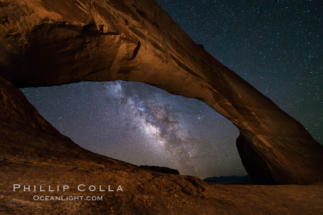 Milky Way and Stars through Wilson Arch. Wilson Arch rises high above route 191 in eastern Utah, with a span of 91 feet and a height of 46 feet, Moab