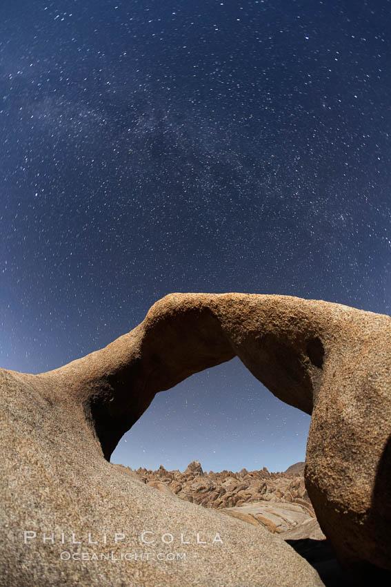 Mobius Arch with the Milky Way galaxy appearing in the night sky above. Alabama Hills Recreational Area, California, USA, natural history stock photograph, photo id 21737