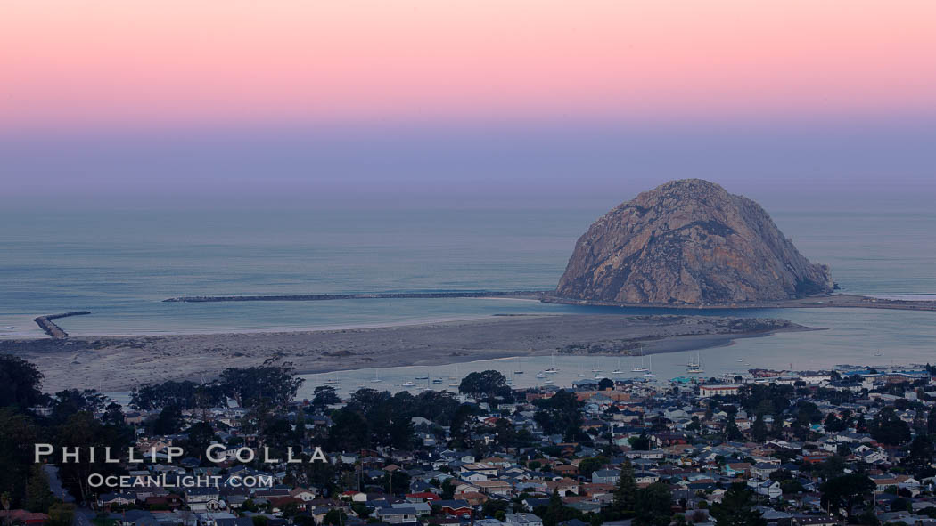 Earth shadow over Morro Rock and Morro Bay.  Just before sunrise the shadow of the Earth can seen as the darker sky below the pink sunrise. California, USA, natural history stock photograph, photo id 22214