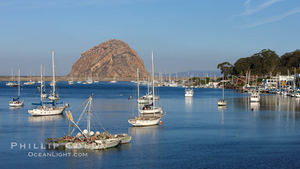 Morro Bay, boats and Morro Rock in the distance. California, USA, natural history stock photograph, photo id 22226