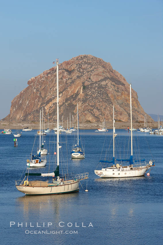 Morro Bay, boats and Morro Rock in the distance. California, USA, natural history stock photograph, photo id 22228