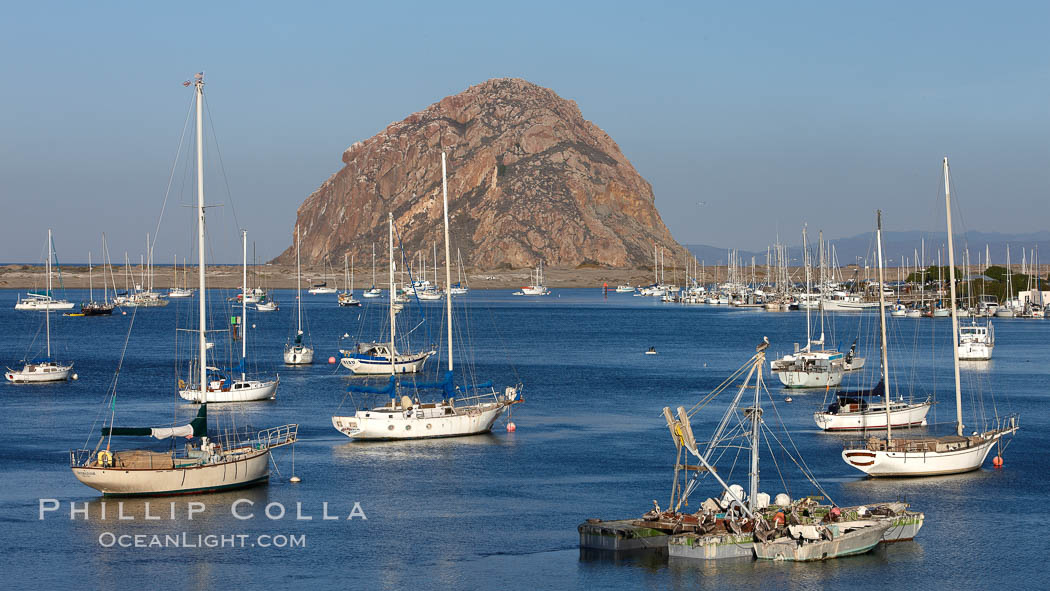 Morro Bay, boats and Morro Rock in the distance. California, USA, natural history stock photograph, photo id 22227