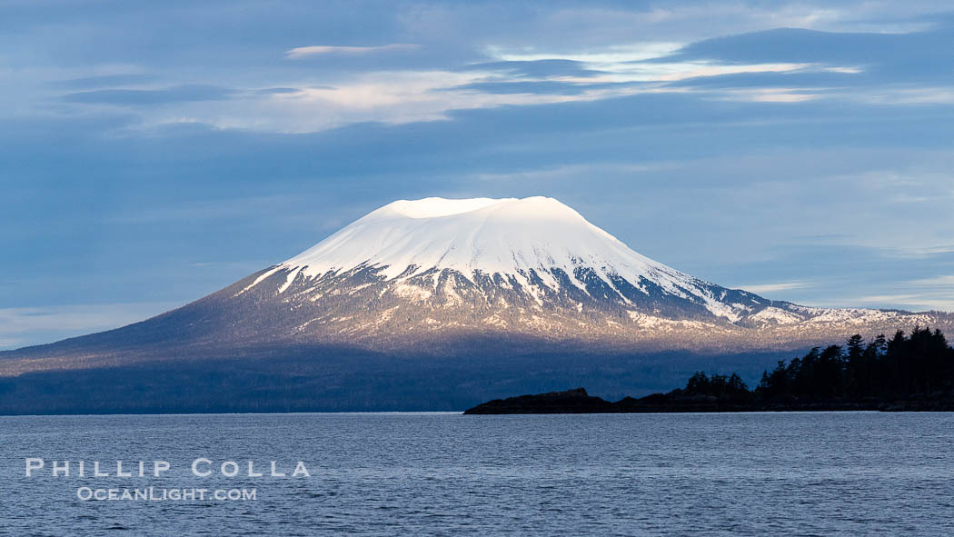 Mount Edgecumbe seen from the Sitka Sound. A volcano, Mount Edgecumbe has an elevation of 3201 feet and lies on the tip of Kruzof Island about 24 miles west of Sitka., natural history stock photograph, photo id 40960