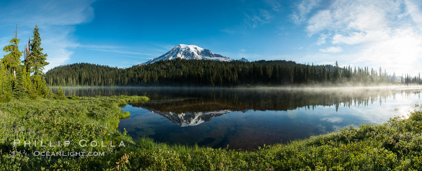 Mount Rainier is reflected in the calm waters of Reflection Lake, early morning, Mount Rainier National Park, Washington