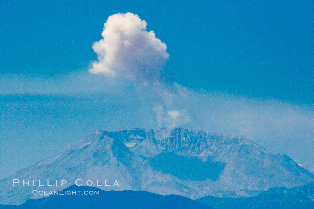 Mount St. Helens releases a burst of steam, viewed from Mount Rainier. Mount Rainier National Park, Washington, USA, natural history stock photograph, photo id 13926