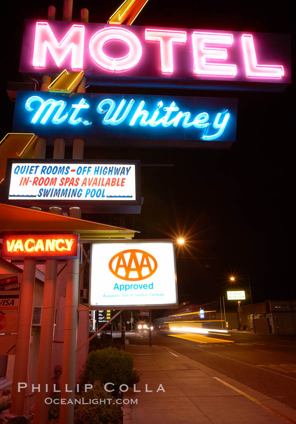 Mt. Whitney Hotel, near signs at night, Highway 395. Lone Pine, California, USA, natural history stock photograph, photo id 21763
