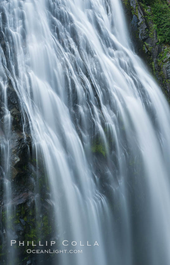 Narada Falls cascades down a cliff, with the flow blurred by a time exposure. Narada Falls is a 188 foot (57m) waterfall in Mount Rainier National Park. Washington, USA, natural history stock photograph, photo id 28718