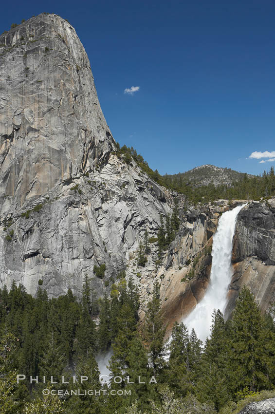 Nevada Falls, with Liberty Cap rising above it. Nevada Falls marks where the Merced River plummets almost 600 through a joint in the Little Yosemite Valley, shooting out from a sheer granite cliff and then down to a boulder pile far below. Yosemite National Park, California, USA, natural history stock photograph, photo id 16128