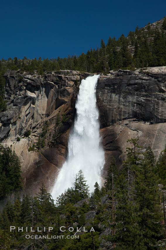 Nevada Falls viewed from the John Muir Trail, Merced River in peak spring flow from heavy snow melt in the high country above Yosemite Valley. Yosemite National Park, California, USA, natural history stock photograph, photo id 26876