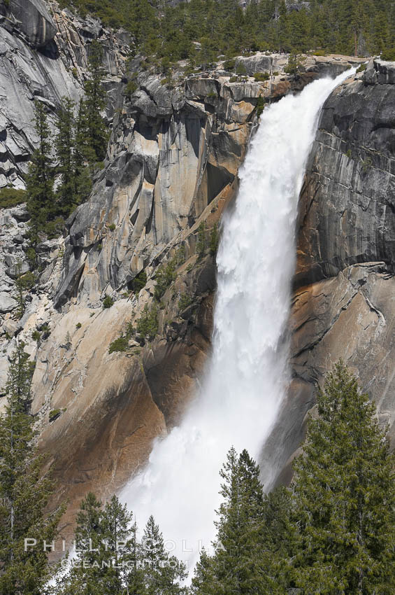 Nevada Falls marks where the Merced River plummets almost 600 through a joint in the Little Yosemite Valley, shooting out from a sheer granite cliff and then down to a boulder pile far below. Yosemite National Park, California, USA, natural history stock photograph, photo id 16119