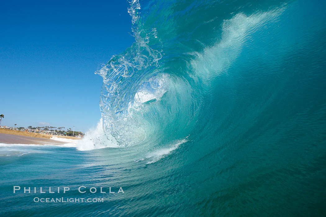 Wave breaking, tube, Newport Beach