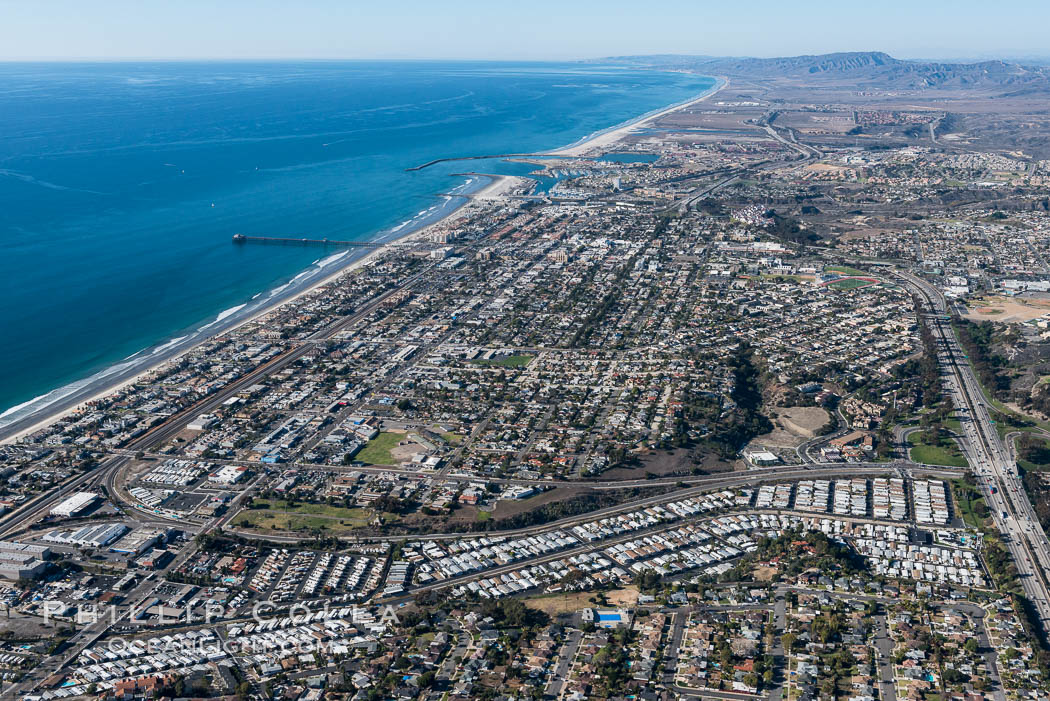 Coastal Oceanside, including Oceanside Pier and Oceanside Harbor, view toward the north showing Camp Pendleton in the distance., natural history stock photograph, photo id 29075